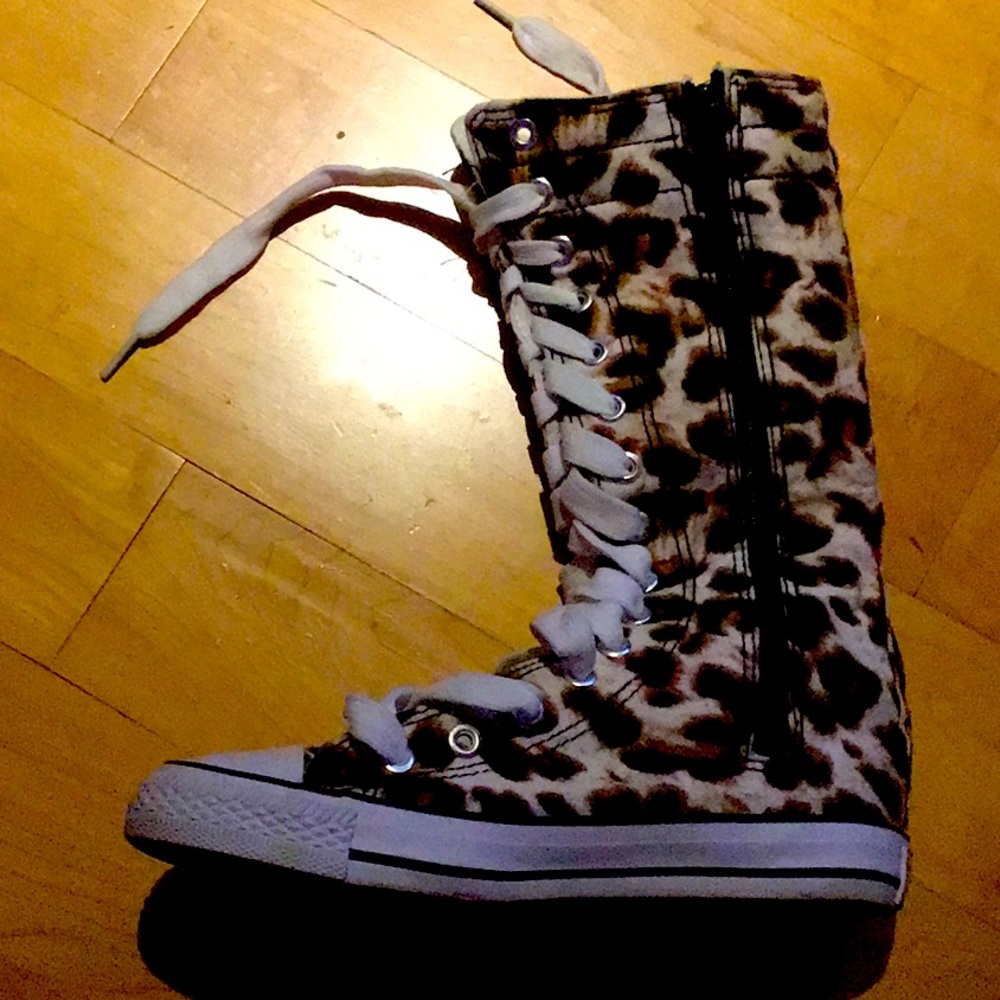 Knee high lepoard shoe